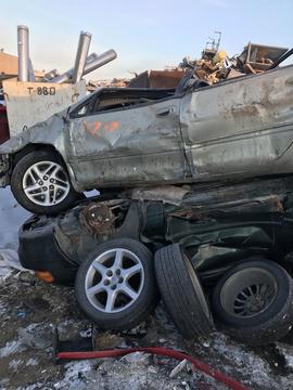 Scrap Yard Near Me | Stacked Junk Cars for Scrap Metal Recycling